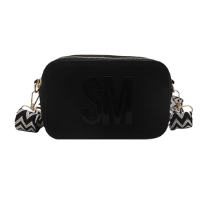 Black camera crossbody bag with bold SM logo and wide patterned strap