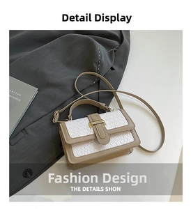 Detail of minimalist crossbody bag with beige leather trim and golden metal clasp