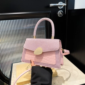 Pink rhinestone handbag with faux crocodile leather texture and golden metal buckle