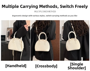 Three-way carry demonstration of white crocodile embossed shell bag on black blazer suit