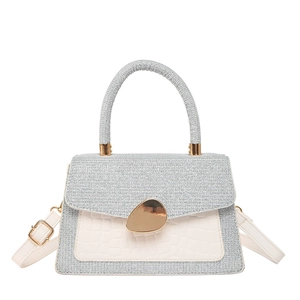 Damen Handtasche in Silberglitzer mit weißem Krokodilmuster und goldener Schließe