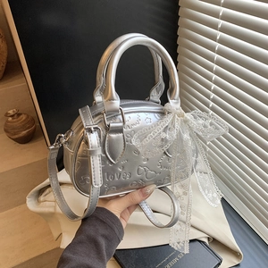 Silver embossed mini Boston bag with silk scarf and lace bow for women in spring style