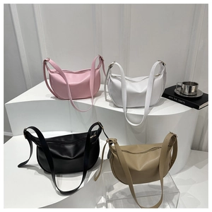 Detailed display of crescent-shaped PU leather bags in pink, white, black, and khaki tones