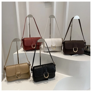Collection of five elegant shoulder bags with stone texture and gold U-shaped metal buckles