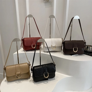 Retro woven textured shoulder bags with gold U-shaped buckles in five various colors