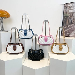 Chic quilted crossbody bags with V-shaped stitching and contrasting piping details
