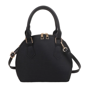 Elegant black crocodile embossed shell handbag with gold hardware and shoulder strap