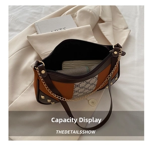 Detail of multi-material vintage bag showing spacious interior for phone and purse