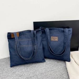 Deep blue denim tote bags for women with contrast stitching and fashion leather patches