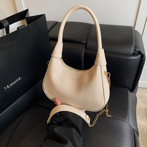 Chic beige woven hobo shoulder bag with fashion lettering and gold chain straps