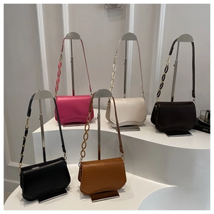 Collection of chic square bags with wavy base and chain straps in five colors