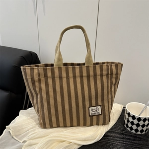 Brown corduroy tote bag with CAMPING label for stylish high school students and commuting
