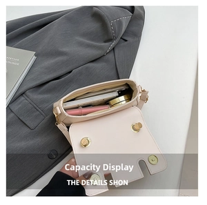 Internal view of beige shoulder bag showing capacity for phone and cosmetics