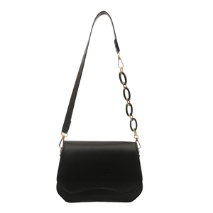 Minimalist black leather underarm bag with unique gold and black chain strap detail