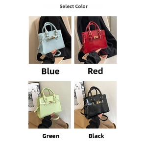 Multiple colors of stylish faux leather handbags with gold twist locks and shoulder straps