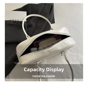 Interior view showing the large storage capacity of this cream white pillow bag