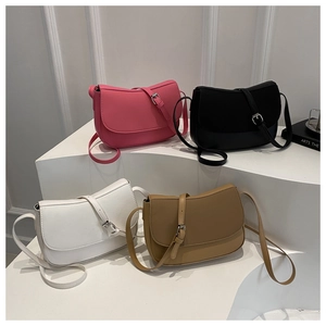 Group display of chic saddle bags in pink, black, white, and khaki for women