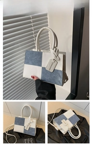 Detailed view of square patchwork shoulder bag with blue plaid and fashion tag