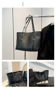 Détail du sac cabas minimaliste en cuir noir mat montrant la grande capacité et fines lanières