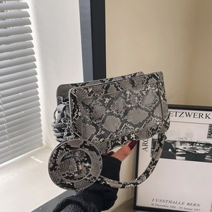 Sac à main rectangulaire motif serpent avec petit porte-monnaie rond et anse rigide