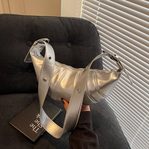 Modern silver crescent hobo bag with pleated leather and wide eyelet strap detail