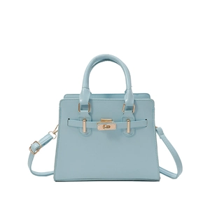 Light blue minimalist handbag with top handles and golden twist lock on white background
