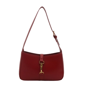 Vintage red leather shoulder bag with gold metal piston lock and adjustable strap