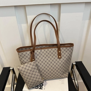 Vintage 2-piece set brown monogram tote bag with leather handles and matching small pouch