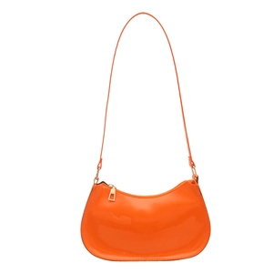 Vibrant orange glossy faux leather baguette shoulder bag with gold hardware and zipper