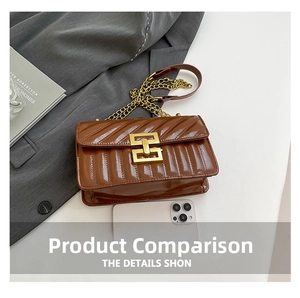 Detail of brown quilted leather bag with large gold geometric buckle and chain strap