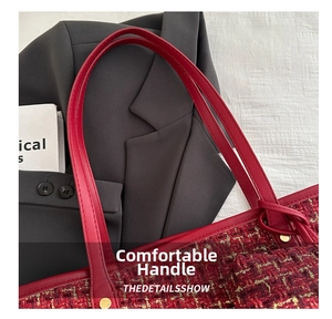 Detail of red tweed tote bag featuring gold thread texture and premium leather handles