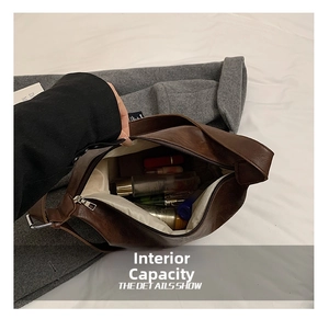 Spacious interior of brown vintage PU leather tote showing large capacity for cosmetics