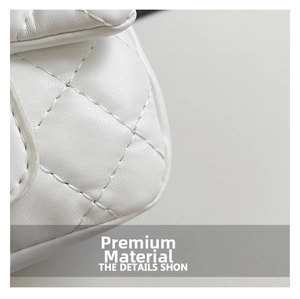 Detail shot of white quilted leather bag with classic diamond stitching and premium texture