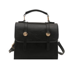 Minimalist black vintage leather handbag with golden buckle and crossbody strap for women