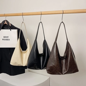 Minimalist large-capacity tote bags in cream, black, and coffee matte faux leather finish
