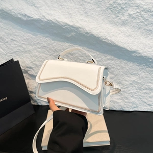Chic off-white leather handbag with wave flap and gold V-embroidery for women