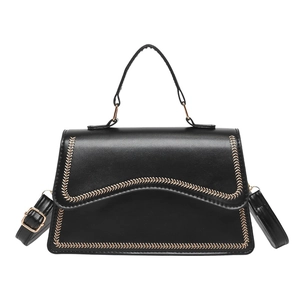 Elegant black square handbag with golden wave embroidery and adjustable shoulder strap