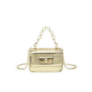 Mini pearl handle crossbody bag in gold crocodile texture with a metallic chain strap