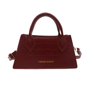 Deep red crocodile embossed tote bag with gold hardware and removable shoulder strap