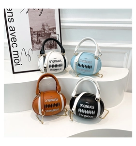 Detail showing rugby-shaped handbags with lychee texture and metallic chain straps