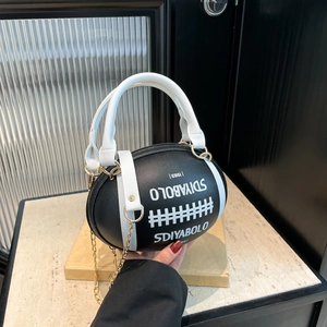 Creative black and white football shaped handbag with metal chain and leather texture