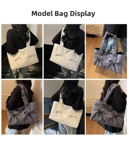 Model display of nylon tote bag with ruched shoulder straps and bow details
