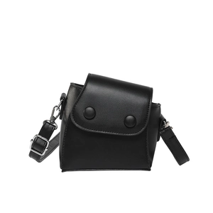 Minimalist black PU leather crossbody bag with two large silver buckles in a retro style