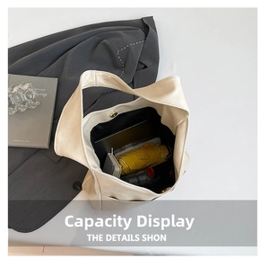 Interior view of off-white leather tote bag showing large capacity for daily items