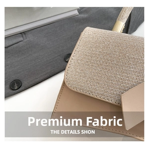 Close-up of champagne gold glitter flap and beige faux leather on stylish crossbody bag