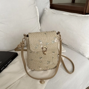 Borsa a secchiello in paglia da donna con ricamo floreale e chiusura in metallo