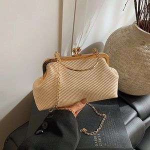 Elegant beige raffia woven clutch with vintage gold metal frame and spherical kiss lock closure