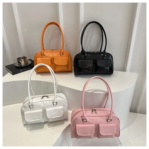 Fashionable tote bags in four colors with double front pockets and long straps