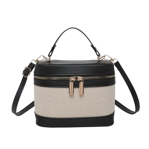 Leopard-print contrast box handbag with black leather trim and gold zippers