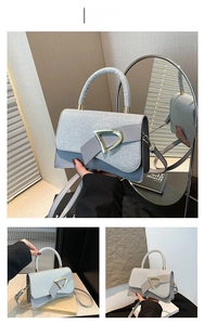 Silver glitter square handbag featuring metallic D-buckle and elegant leather shoulder strap